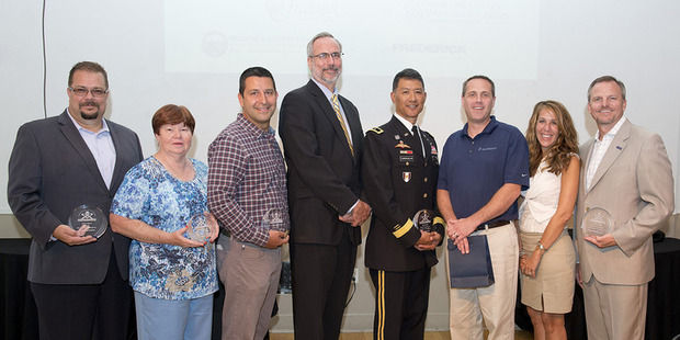 Orases team accepting best places to work award