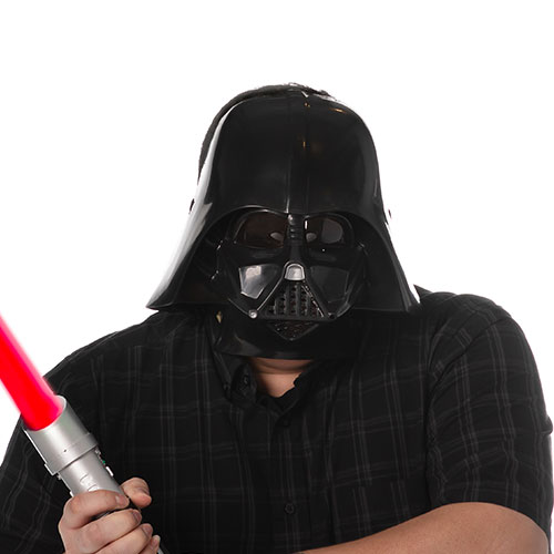 javier cortes team member at orases wearing a darth vader mask and light saber