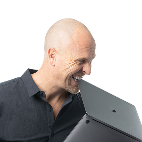 jon weaver team member at orases biting edge of laptop