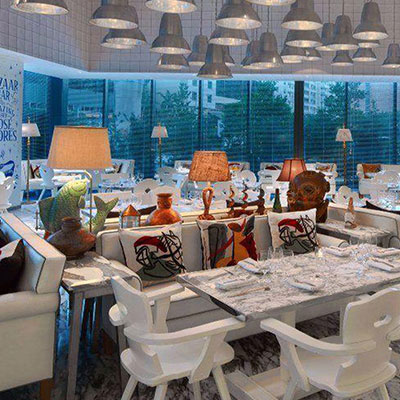 view of jose andres restaurant with white furniture