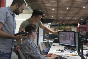 three software developers are testing their newly developed software