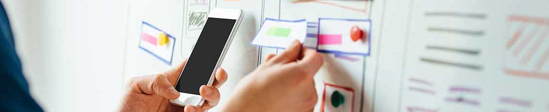 Mobile application developer working on new mobile app