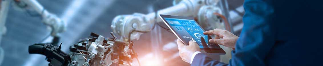 Man using custom software for manufacturing industry