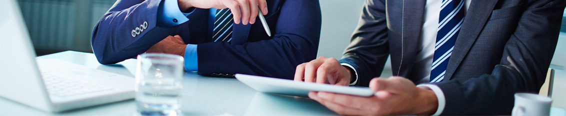 two business owners considering IT staff augmentation for their organization