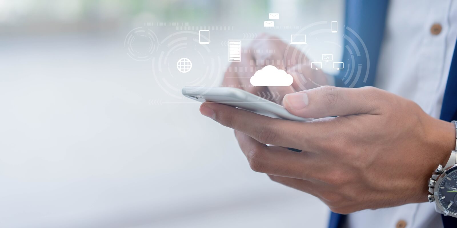 businessman hand holding smartphone to synchronize on SaaS host