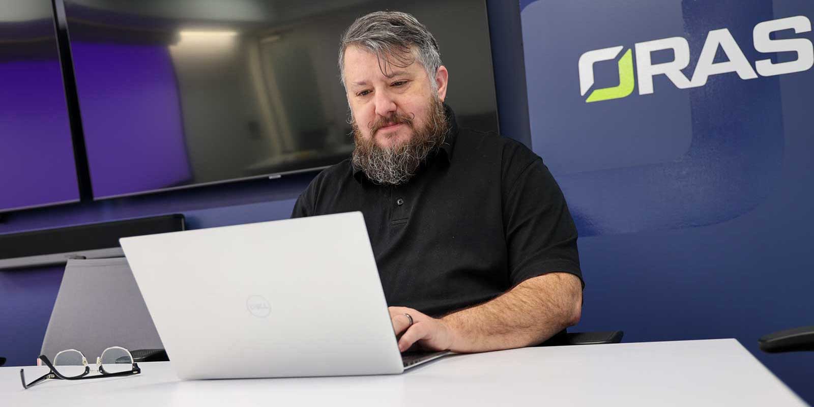 Software developer working on a custom home patient software solution