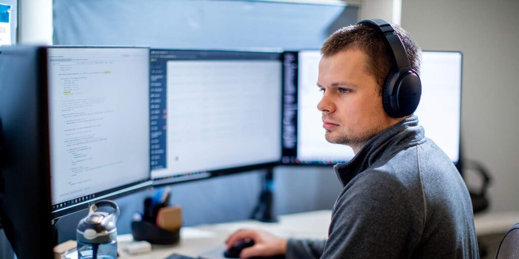 Orases developer on computer working on node.js development