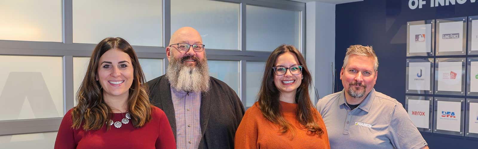 Orases team members at event