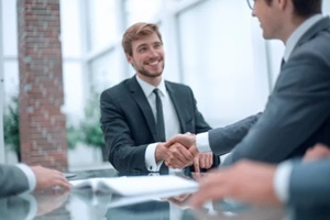 business partners greet each other at a business meeting
