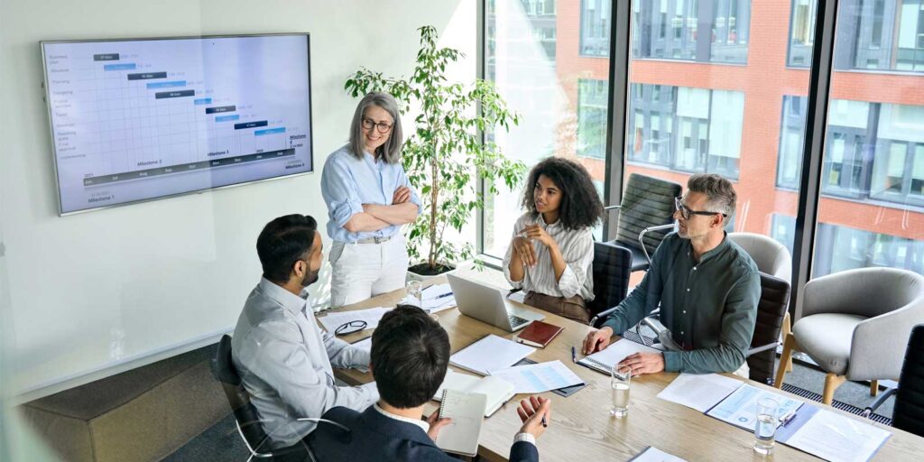 CEO running a board meeting