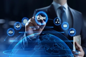 businessman pressing crm button on virtual screen