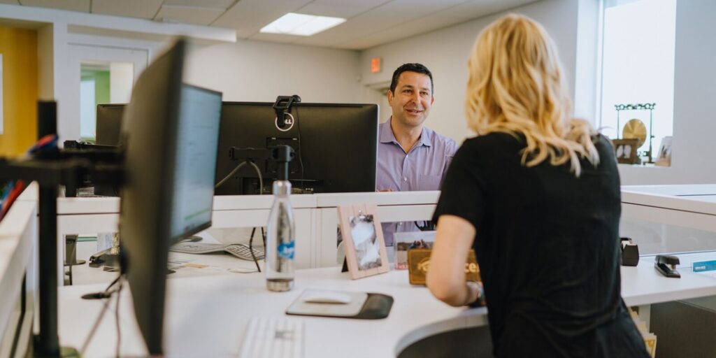 collegues over the desk discussions