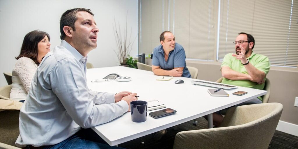people during a presentation in an office