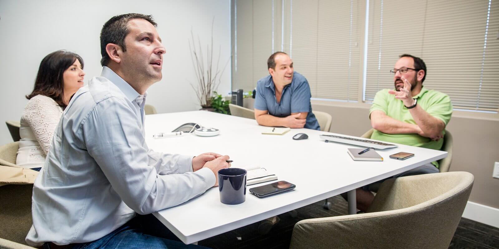 people during a presentation in an office