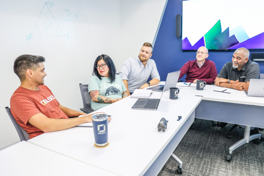 Orases team in a meeting working together.