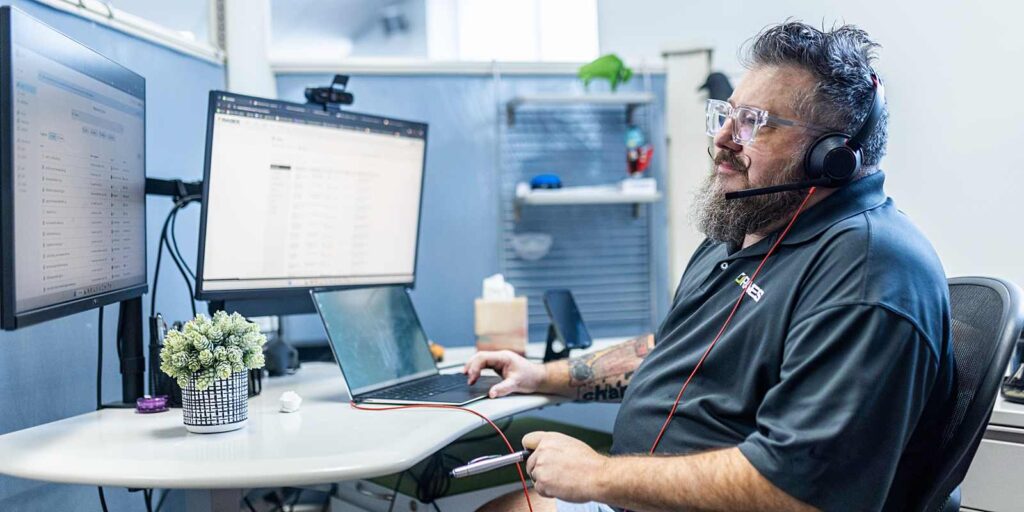 customer support employee working on desktop