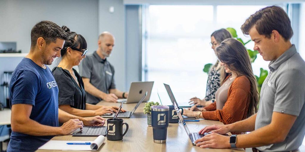 team of custom software developers working together