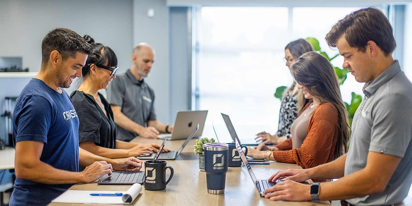 team of custom software developers working together