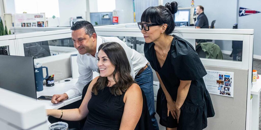 employees reviewing Custom Product Configurator
