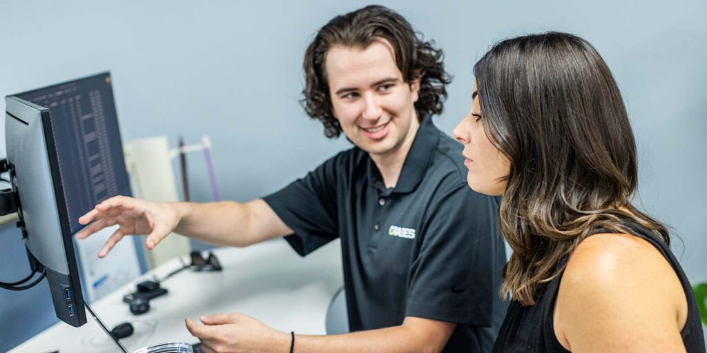 two orases employees reviewing application development