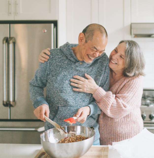 Elderly Couple Hugging