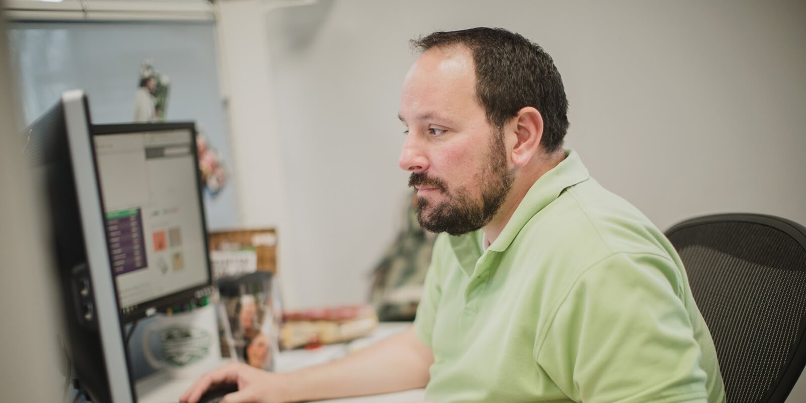 male employee working on ai agent consulting in an office